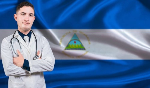 Portrait of medical professional on Nicaragua flag background. Nicaraguan national health system