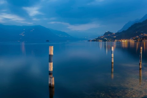 Iseo Lake, Lombardy, North Italy. Lake Iseo s placid water in the evening light