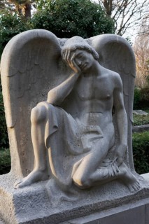 Funerary sculpture of a mourning angel, Nordfriedhof Düsseldorf, North Rhine-Westphalia, Germany