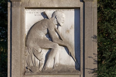 Grave relief old man with walking stick, Nordfriedhof Düsseldorf, North Rhine-Westphalia, Germany