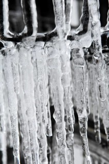 Bicycle icy due to freezing rain, icicles, detailed view