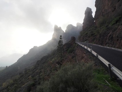 Mountain road on steep rocks in foggy weather, Cruz Grande, Gran Canaria, Canary Islands, Canary