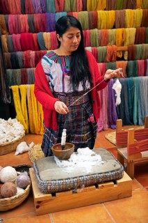 Maya woman, 42 years old, spinning cotton, traditional craft in a woman's cooperative, San Juan la