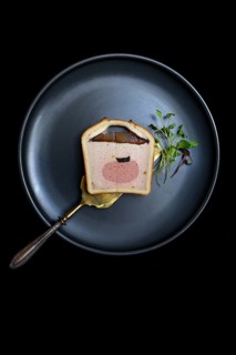 Battered pate on plate with microgreen