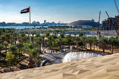 View of Al Masar Garden and the roof of Louvre Abu Dhabi from the Zayed National Museum platform,