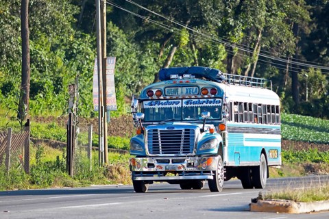 Blue bus on the main street in Panajachel, Atitlán, Sololá Department, Guatemala
