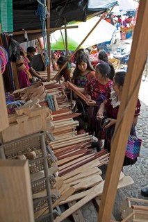 Mayan woman wearing traditional clothes at the market in Chichicastenango, Highlands, El Quiché