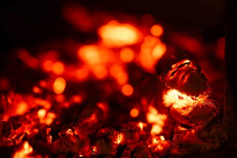 Glowing wood from a burning fireplace, log, embers, fire
