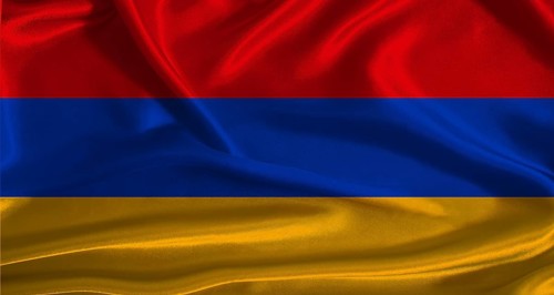 Armenia flag with cloth textured background. National flag of Armenia with realistic texture