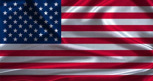 United States flag with cloth textured background. National flag of the United States with
