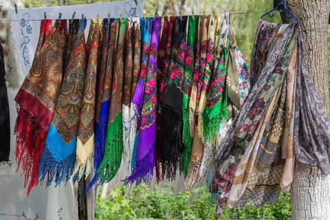 Colourful headscarves on a leash, souvenirs at Voronet Monastery, Buckovina, Romania
