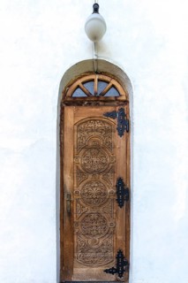 Carved main entrance to Romanian Orthodox monastery Bogdana, Radauti, Romania