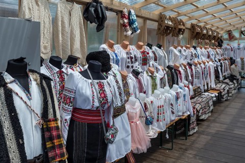 Shop selling Romanian traditional costume clothing for tourists, Vorone?, Romania