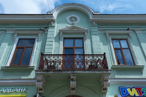 Renovated house, 19th century, with rusty balcony, Czernowicz, Ukraine