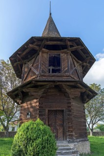 Wooden bell tower near the Church of the Exaltation of the Cross, Patrauti Moldavian monastery from