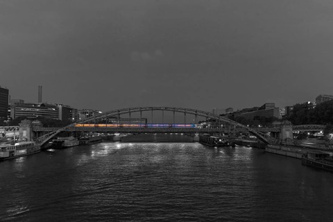 Night-time subway across the Viaduc d'Austerlitz, across the Seine, black and white, Paris, France
