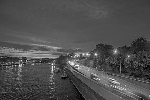 View of the Seine at night, the towers of Notre Dame in black and white, Paris, France