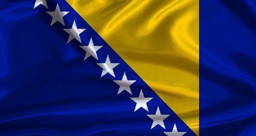 Bosnia and Herzegovina flag with cloth textured background. National flag of Bosnia and Herzegovina