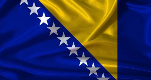 National flag of Bosnia and Herzegovina with cloth texture. Bosnia and Herzegovina flag with