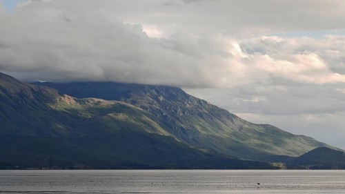 Landscape view of hills under a cloud cover, bordering a lake, Lake Ohrid, North Macedonia