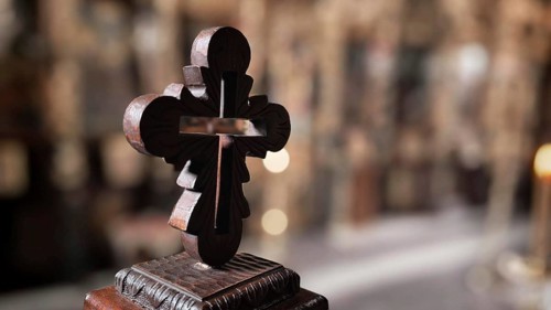 Close-up of an artfully designed wooden cross against a blurred background, North Macedonia