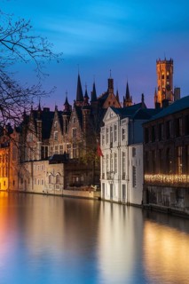 Bruges. Belgium. Flanders. Houses in the historic district overlooking a canal. UNESCO