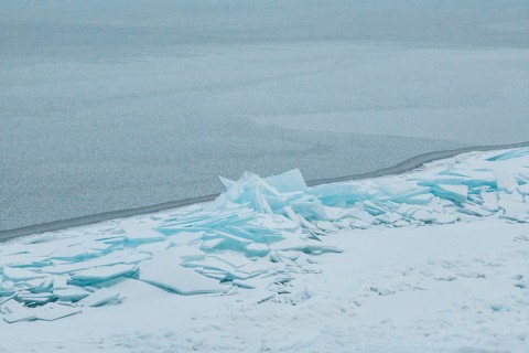 Lake Baikal, Siberia, Russia. Frozen lake caps broken in deep winter reminiscent of a Caspar David