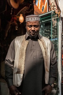 Misurata, Libya, North Africa. A Libyan man from one of the numerous desert tribes in his shop in