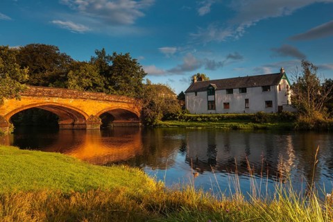 Callander, Stirling, Scotland, UK. The red bridge over the River Teith