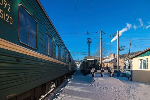 Siberia, Russia. A train station with the Trans Siberian railway on its way to Moscow