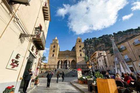Piazza del Duomo, picturesque square with cathedral and street café, stroller, medieval old town,