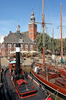 Museum harbour, museum ships, historic scales and the town hall, Leer, East Frisia, Germany
