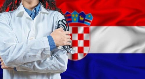 Healthcare professional with Croatia flag background. Professional doctor holding stethoscope on