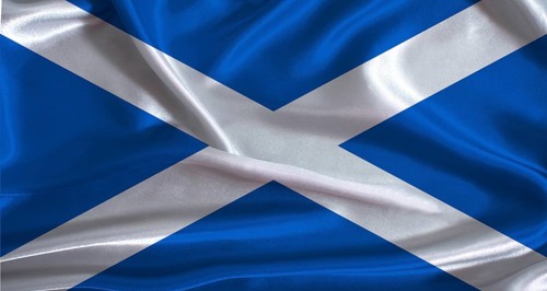 Scotland flag with cloth textured background. National flag of Scotland with realistic texture