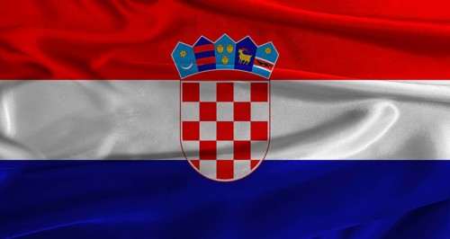 Flag of Croatia with fabric textured background. Close up of National flag of Croatia with