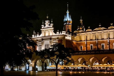Night view of Rynek with Cloth Hall, from 13th century, Main Market Square, city landmark, Krakow,
