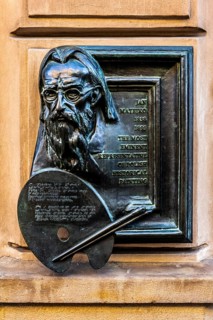 Memorial plaque for the famous Polish painter Matejko, details of the old town alleys, Krakow,