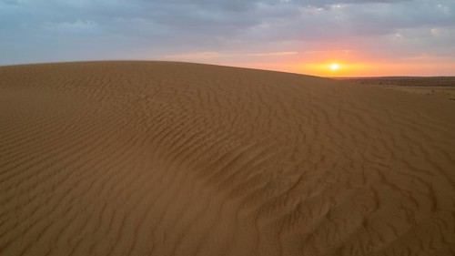 Sunset, sand dunes in the Wahiba Sands desert, Oman