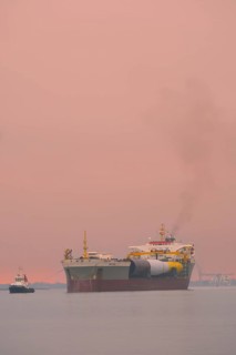 A semi-submersible ship is towed from the Weser to the North Sea, Bremerhaven, Bremen, Germany