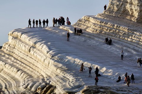 Terraced chalk cliffs Scala dei Turchi, walkers on Turkish steps, Realmonte, Agrigento, Sicily,