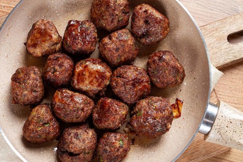 Fried meatballs in a frying pan, homemade, no people