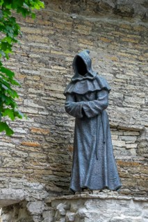 Monk sculpture, one of three bronze statues of faceless monks at the Danish King's Garden in the