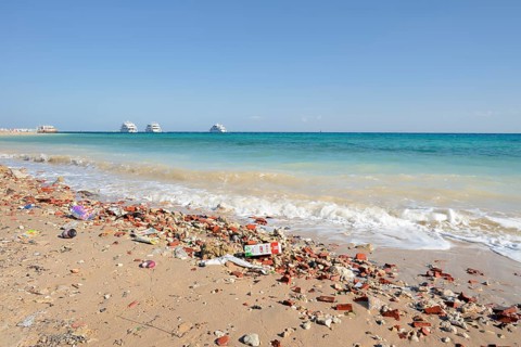 Beach with washed up trash, Hurghada, Red Sea Governorates, Egypt