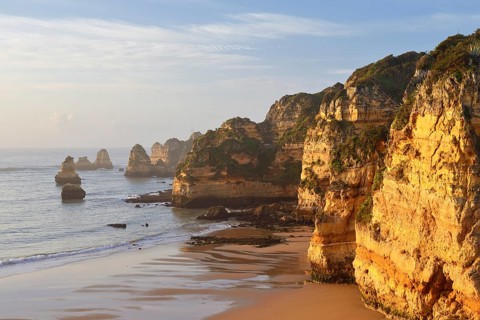 Rocky coast and beach, Praia Dona Ana, Lagos, Algarve, Portugal