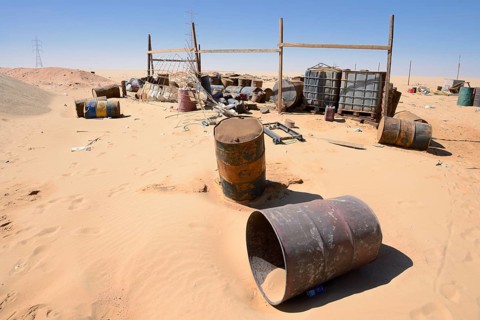 Empty kerosene barrels at a gas station in the Arabian Desert, Egypt