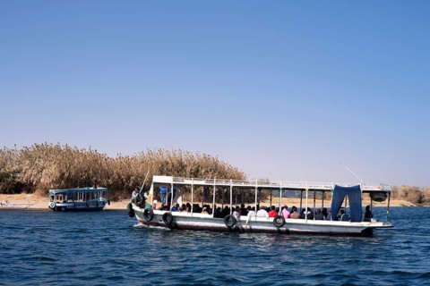 Sightseeing boat on the Nile, Aswan, Egypt
