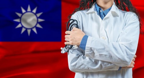 Healthcare professional with Taiwan flag background. Professional doctor holding stethoscope on