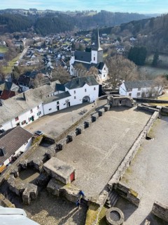 View of preserved keep made of quarry masonry castle tower on castle ruins Burghof restored