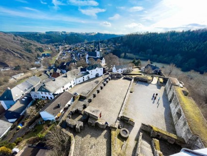 View from preserved castle tower to castle ruins Burghof restored preserved foundations remains of