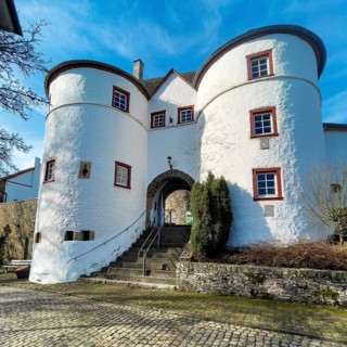 View of Osttor with staircase passage into preserved inhabited bailey of medieval hilltop castle